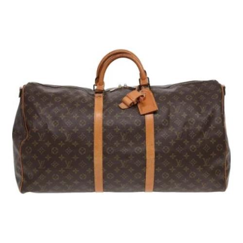 Pre-owned Canvas travel-bags Louis Vuitton Vintage , Brown , Dames