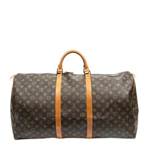 Pre-owned Canvas travel-bags Louis Vuitton Vintage , Brown , Dames