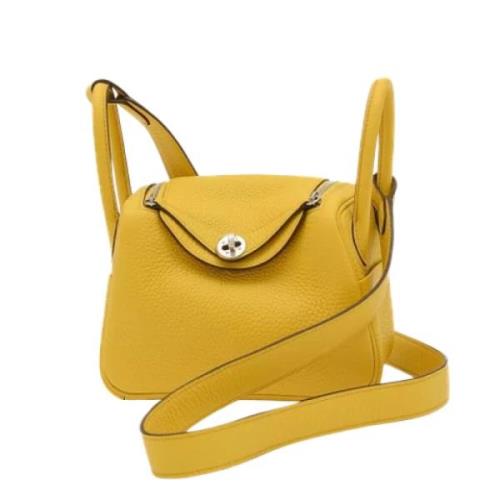 Pre-owned Leather handbags Hermès Vintage , Yellow , Dames