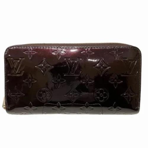 Pre-owned Leather wallets Louis Vuitton Vintage , Purple , Dames