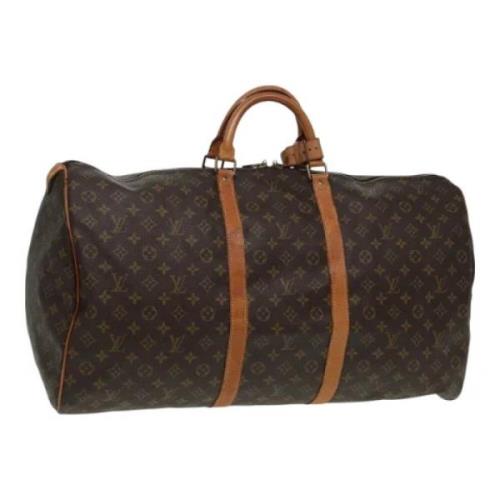 Pre-owned Canvas travel-bags Louis Vuitton Vintage , Brown , Dames