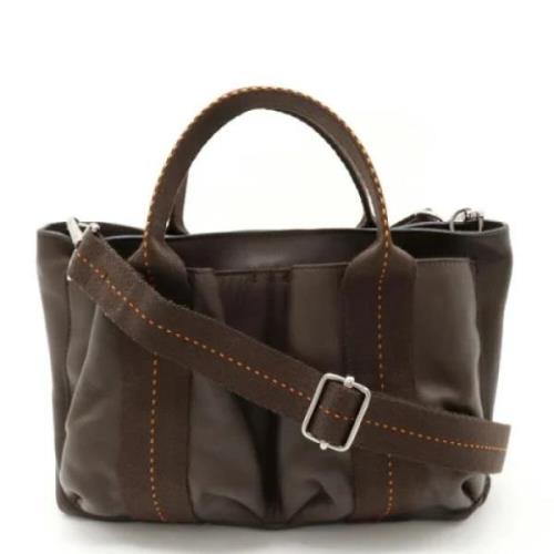 Pre-owned Leather handbags Hermès Vintage , Brown , Unisex