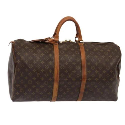 Pre-owned Canvas travel-bags Louis Vuitton Vintage , Brown , Dames