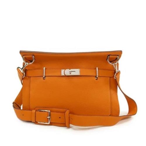 Pre-owned Leather crossbody-bags Hermès Vintage , Orange , Dames