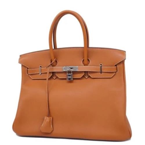 Pre-owned Leather handbags Hermès Vintage , Orange , Dames