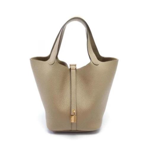 Pre-owned Leather handbags Hermès Vintage , Beige , Dames