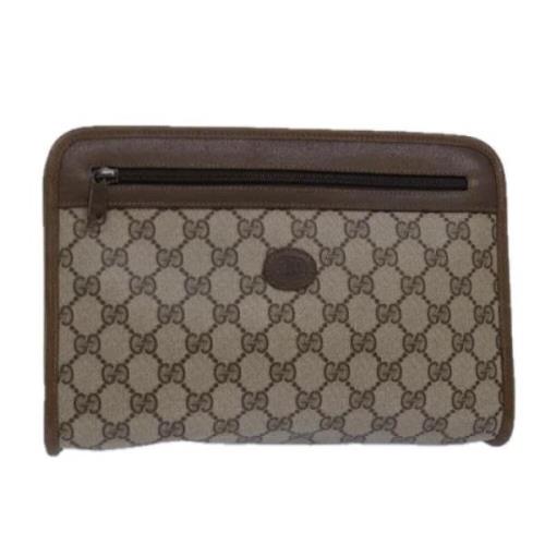 Pre-owned Leather clutches Gucci Vintage , Beige , Dames