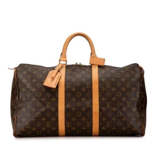 Pre-owned Canvas travel-bags Louis Vuitton Vintage , Brown , Dames