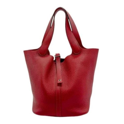 Pre-owned Leather handbags Hermès Vintage , Red , Dames