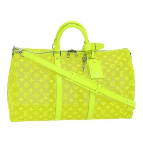 Pre-owned Canvas travel-bags Louis Vuitton Vintage , Yellow , Dames