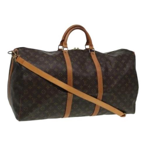 Pre-owned Canvas travel-bags Louis Vuitton Vintage , Brown , Dames