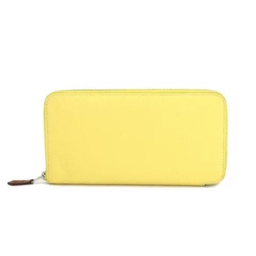 Pre-owned Leather wallets Hermès Vintage , Yellow , Dames