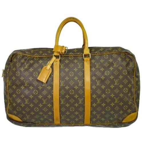 Pre-owned Canvas travel-bags Louis Vuitton Vintage , Brown , Dames