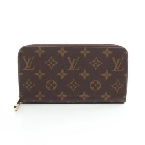 Pre-owned Fabric wallets Louis Vuitton Vintage , Brown , Dames