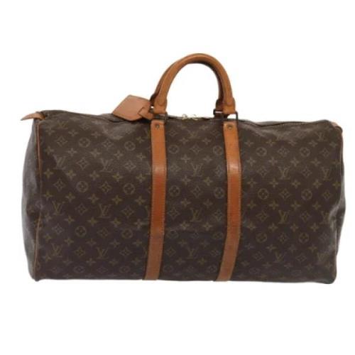 Pre-owned Canvas travel-bags Louis Vuitton Vintage , Brown , Dames