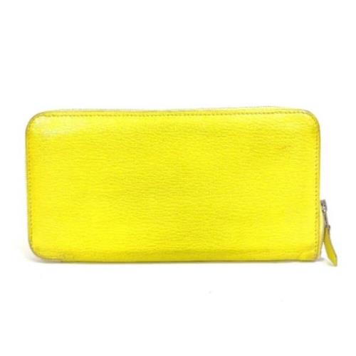 Pre-owned Leather wallets Hermès Vintage , Yellow , Dames