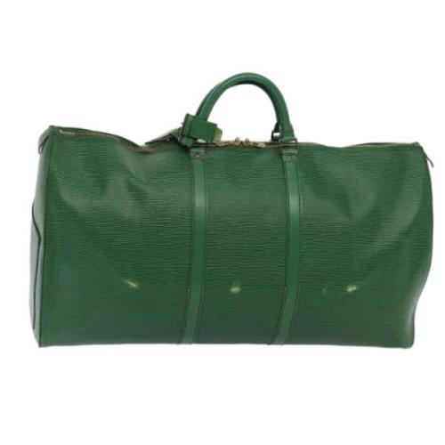 Pre-owned Leather travel-bags Louis Vuitton Vintage , Green , Dames