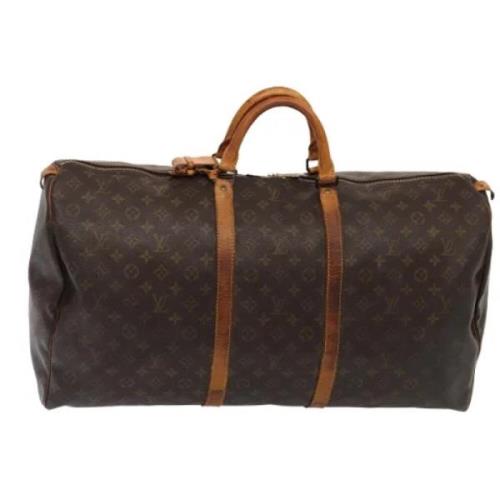 Pre-owned Canvas travel-bags Louis Vuitton Vintage , Brown , Dames