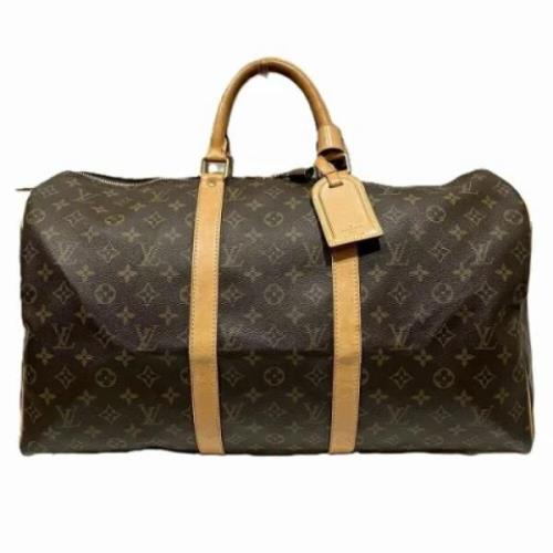 Pre-owned Canvas travel-bags Louis Vuitton Vintage , Brown , Dames