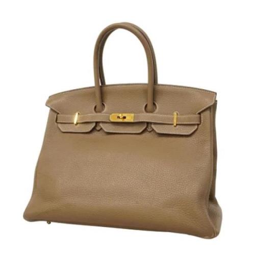 Pre-owned Leather handbags Hermès Vintage , Brown , Dames