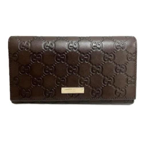 Pre-owned Leather wallets Gucci Vintage , Brown , Dames