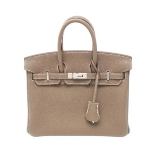 Pre-owned Leather handbags Hermès Vintage , Beige , Dames