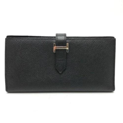 Pre-owned Leather wallets Hermès Vintage , Black , Dames