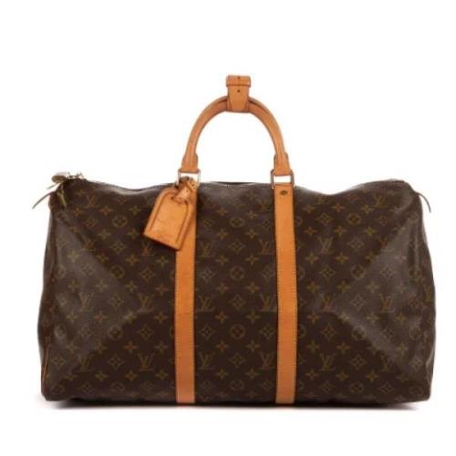 Pre-owned Coated canvas handbags Louis Vuitton Vintage , Brown , Dames