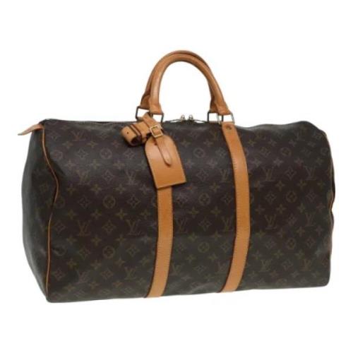 Pre-owned Canvas travel-bags Louis Vuitton Vintage , Brown , Dames