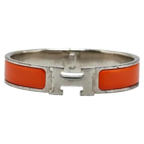 Pre-owned Metal bracelets Hermès Vintage , Orange , Dames