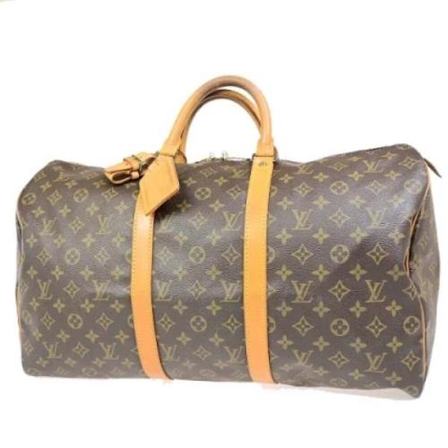 Pre-owned Canvas travel-bags Louis Vuitton Vintage , Brown , Dames