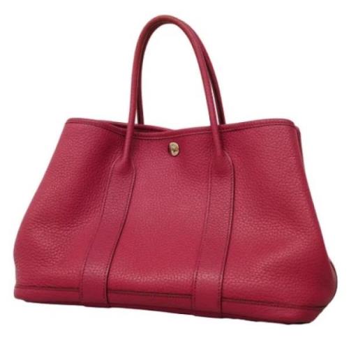 Pre-owned Leather handbags Hermès Vintage , Pink , Dames