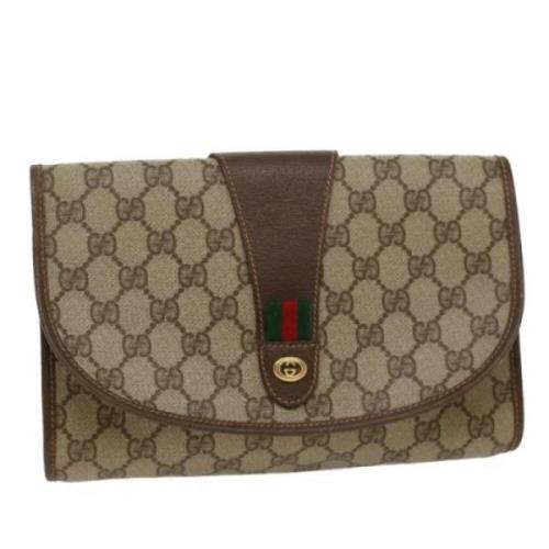 Pre-owned Canvas clutches Gucci Vintage , Beige , Dames