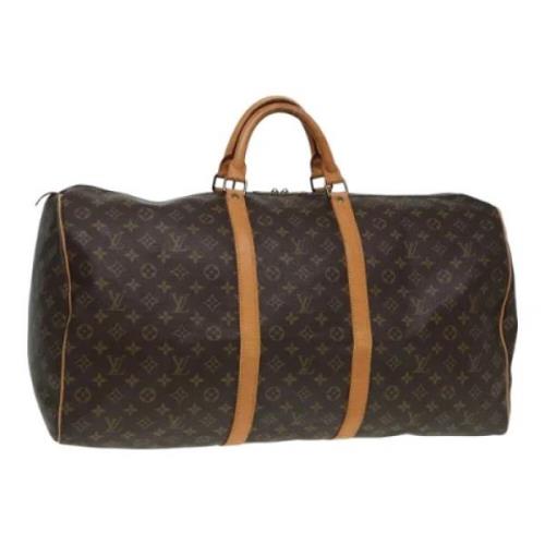 Pre-owned Canvas travel-bags Louis Vuitton Vintage , Brown , Dames