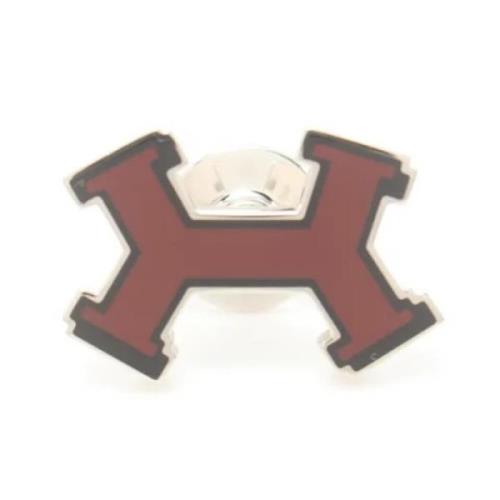 Pre-owned Stainless Steel brooches Hermès Vintage , Red , Dames