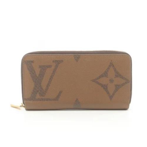 Pre-owned Coated canvas wallets Louis Vuitton Vintage , Brown , Dames