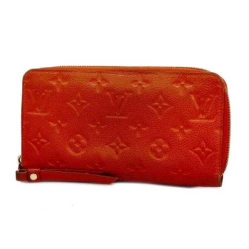 Pre-owned Fabric wallets Louis Vuitton Vintage , Orange , Dames