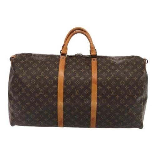 Pre-owned Canvas travel-bags Louis Vuitton Vintage , Brown , Dames