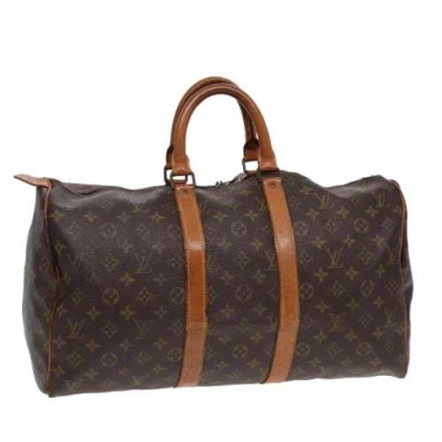 Pre-owned Canvas handbags Louis Vuitton Vintage , Brown , Dames