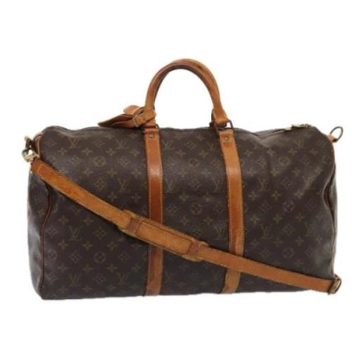 Pre-owned Canvas handbags Louis Vuitton Vintage , Brown , Dames