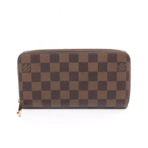 Pre-owned Coated canvas wallets Louis Vuitton Vintage , Brown , Dames