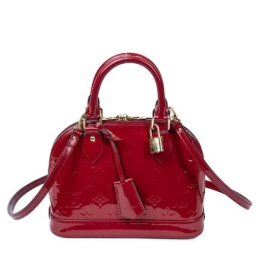 Pre-owned Leather handbags Louis Vuitton Vintage , Red , Dames