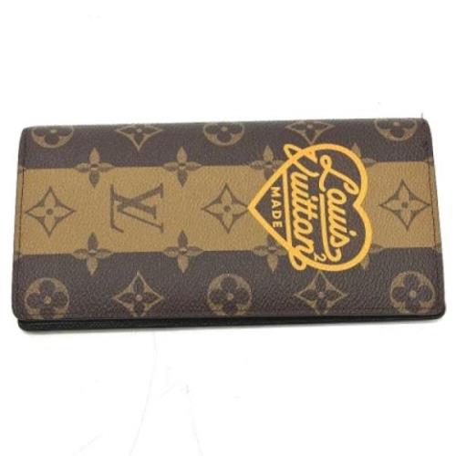 Pre-owned Fabric wallets Louis Vuitton Vintage , Brown , Dames