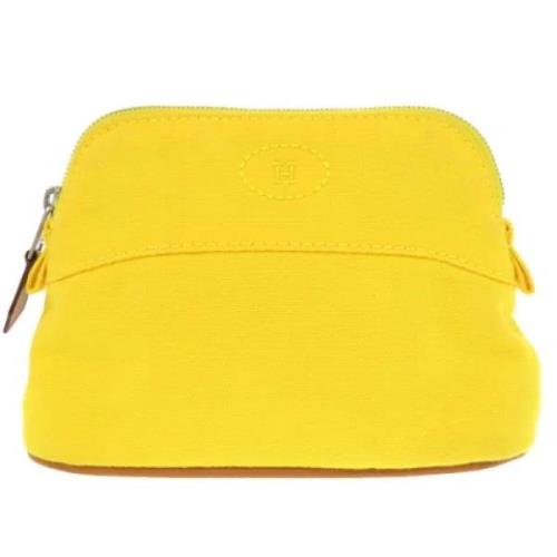 Pre-owned Cotton pouches Hermès Vintage , Yellow , Dames