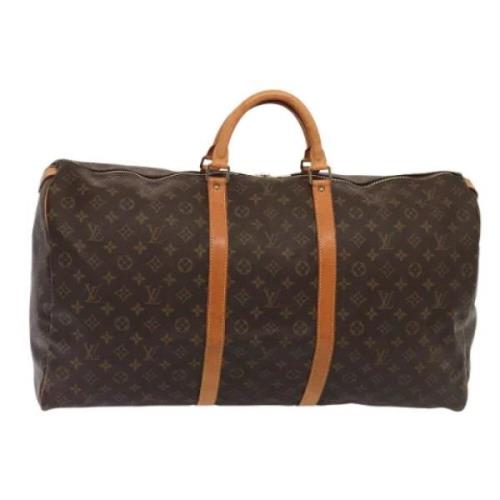 Pre-owned Canvas travel-bags Louis Vuitton Vintage , Brown , Dames