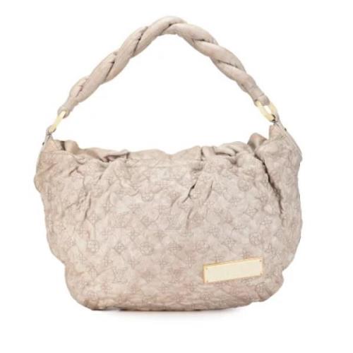 Pre-owned Leather handbags Louis Vuitton Vintage , Beige , Dames