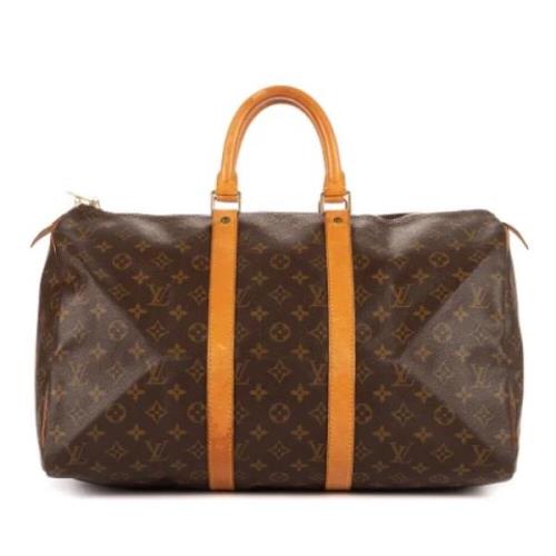 Pre-owned Coated canvas handbags Louis Vuitton Vintage , Brown , Dames