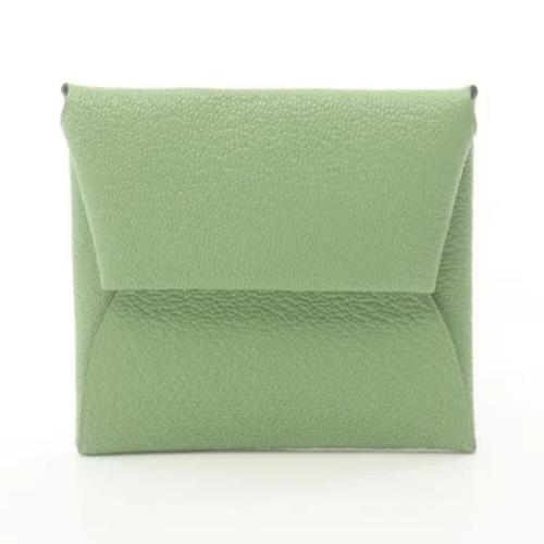 Pre-owned Leather wallets Hermès Vintage , Green , Dames