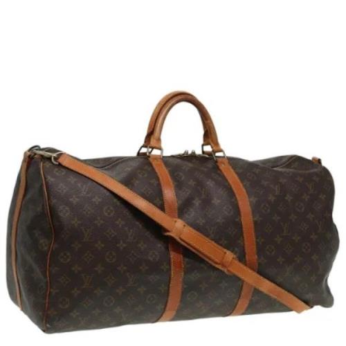 Pre-owned Canvas handbags Louis Vuitton Vintage , Brown , Dames