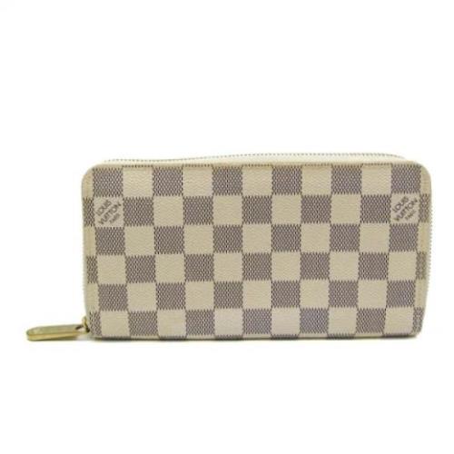 Pre-owned Fabric wallets Louis Vuitton Vintage , Beige , Dames